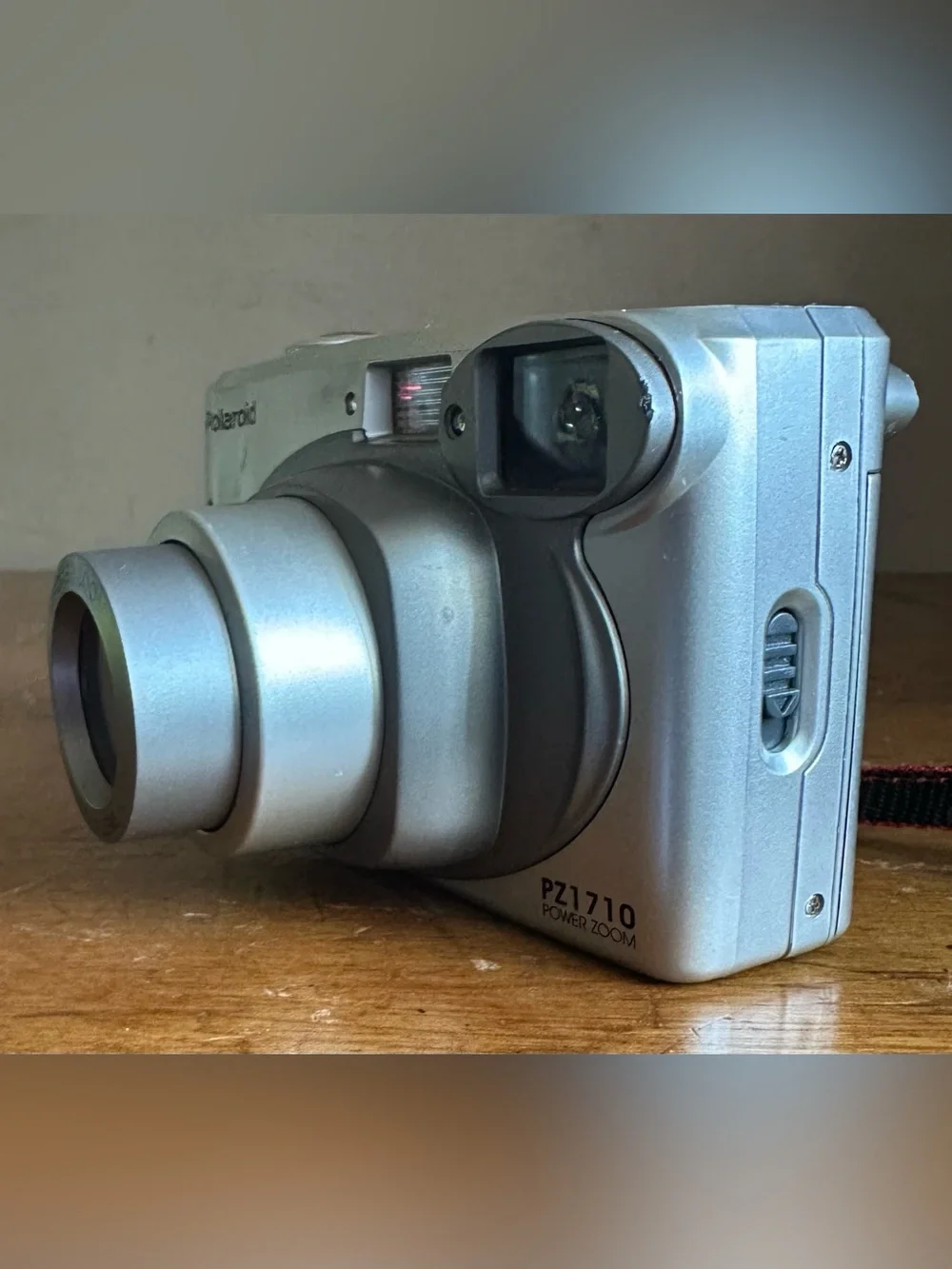 Polaroid Silver Point-and-Shoot Camera with Red-Trim Strap